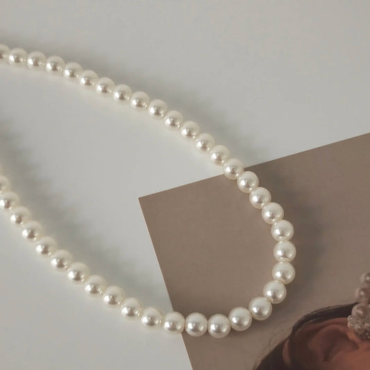 Classic Grace – Round Shell Pearl Necklace