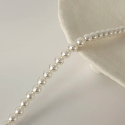 Classic Grace – Round Shell Pearl Necklace