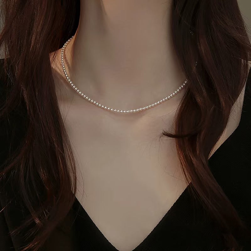 Classic Grace – Round Shell Pearl Necklace