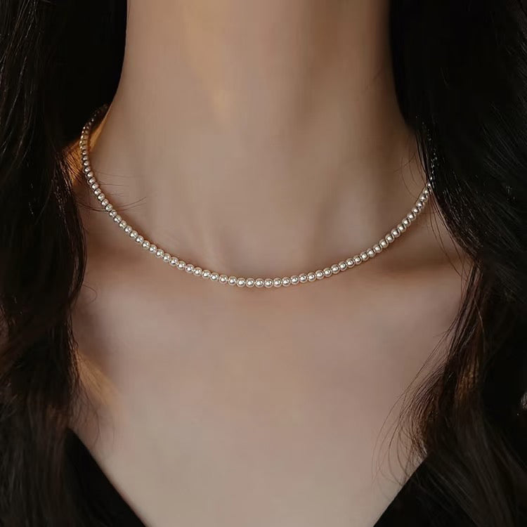 Classic Grace – Round Shell Pearl Necklace